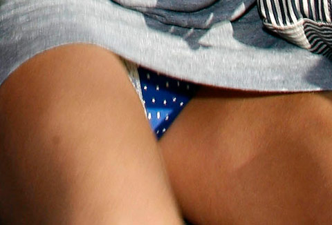  with little white stars for photographers Sienna Miller upskirt
