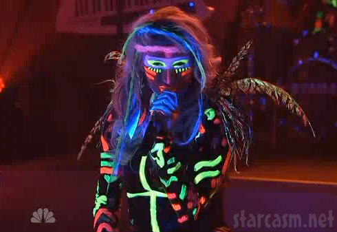 kesha young picture. Ke$ha performs in fluorescent