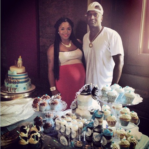 Pregnant Rasheeda Frost with husband Kirk Frost at her baby shower August 11