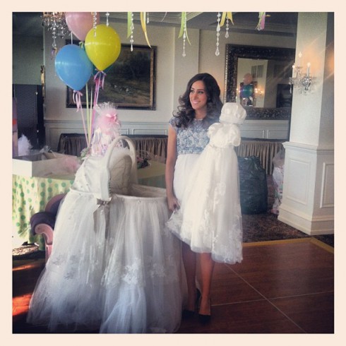 Pregnant Danielle Jonas with bassinet made from her wedding dress and daughter's coronation gown too