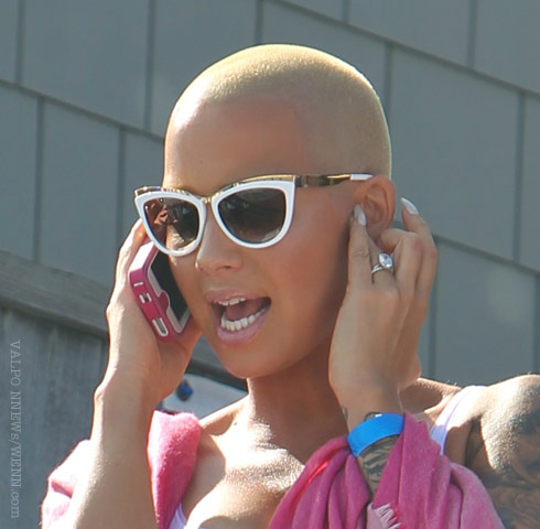 A day after news broke that Amber Rose had filed for divorce from rapper Wiz Khalifa, the model and singer has suggested that her husband cheated.