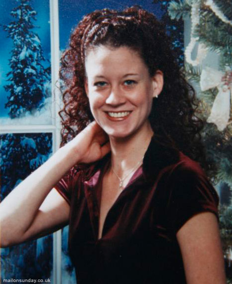 Mindy Lawton poses for a Christmas card photo