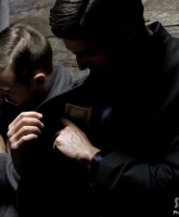 Men check their pockets before being inspected by Countess LuAnn de Lesseps