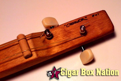 2-string cigar box guitar headstock