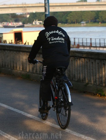 Bob Dylan bicycling in a Brooklyn Vinders Motorcycle club jacket