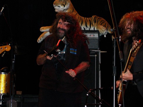 Mankind Mick Foley bangs on a cowbell for Grace Potter and the Nocturnals