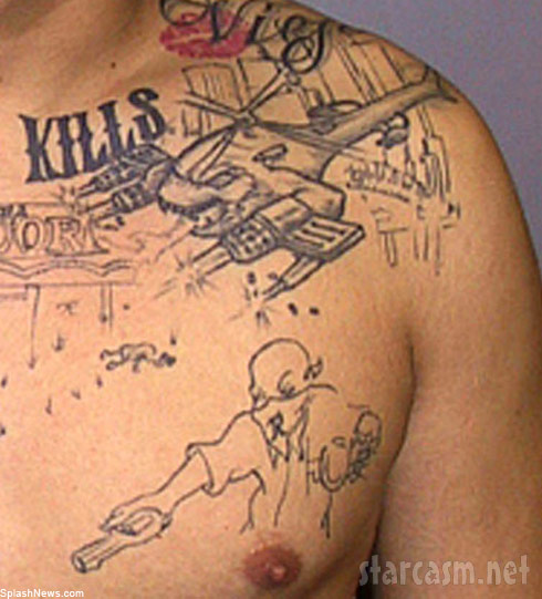 PHOTOS Busted: Man gets murder scene tattoo