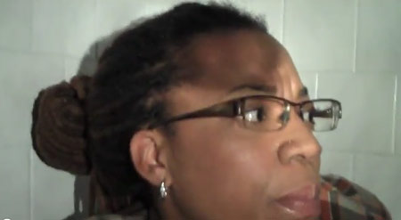 Megan McGlover delivers a weather report video from her bathtub