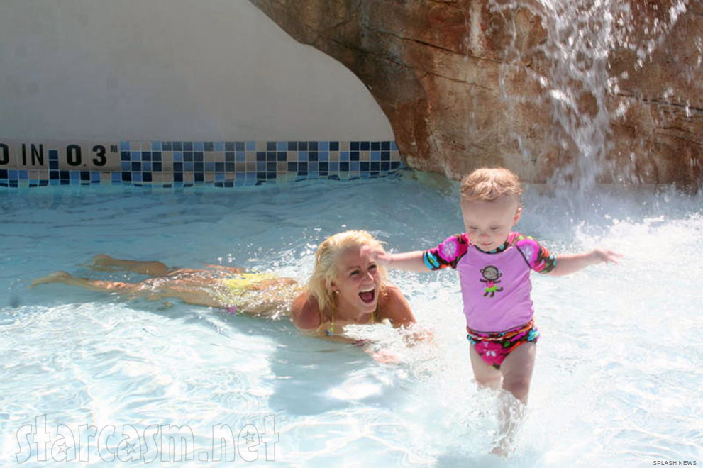 Teen Mom Leah Messer plays with daughter Aleeah in a pool in Orlando