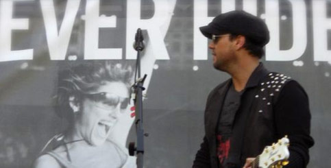 Tim Mahoney is part of Adam Levine's team on The Voice