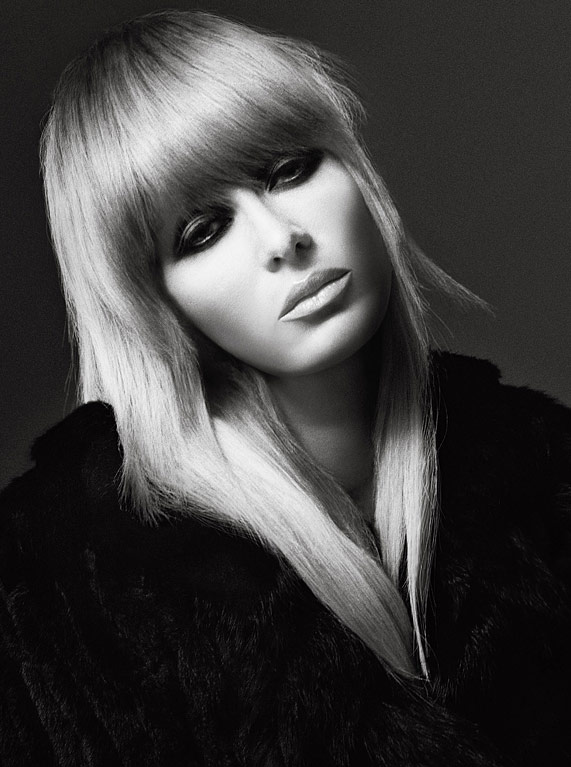 Paris Hilton transforms with bangs