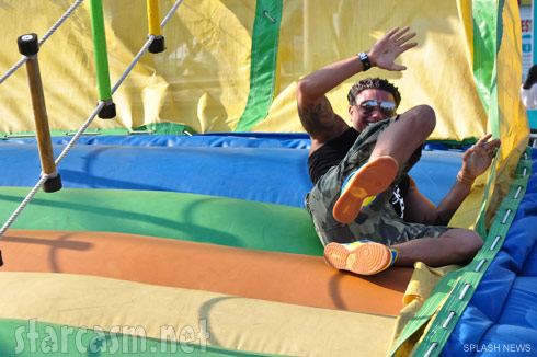PAuly D on an inflatable slide while celebrating his birthday July 5 2011