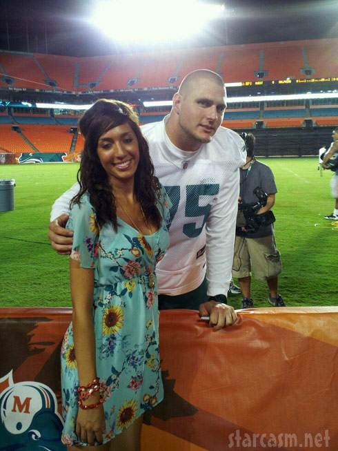 A Miami Dolphins player poses with Teen Mom Farrah Abraham