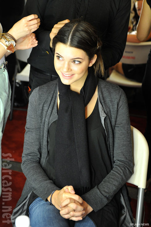 Kendall Jenner gets her makeup done backstage at the Sherri Hill Spring 2012 fashion show