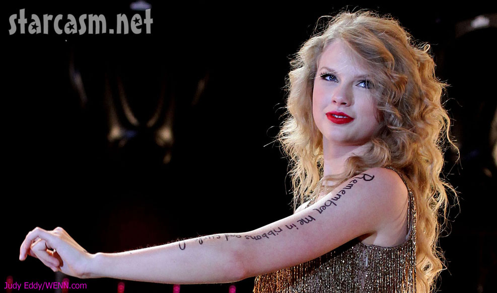 What does taylor swift write on her arms during concerts lyrics