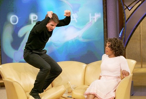 Tom Cruise jumping on Oprah's couch during talk show