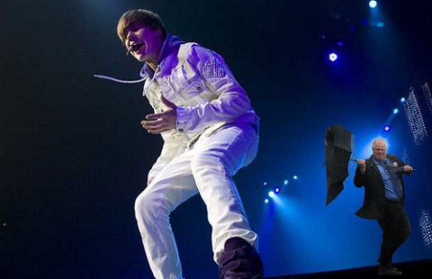 Justin Bieber singing at his concert