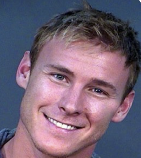 Kasey Kahl happy mug shot (smiling)