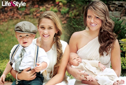 Kroy, Ariana, and Brielle pose with their new brother, Kash Kade Biermann