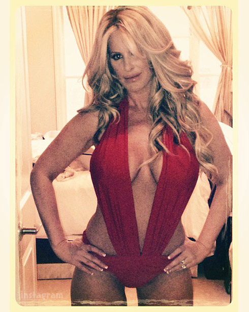 PHOTO Kim Zolciak in a sexy Lilly Ghalichi Have Faith swimsuit.