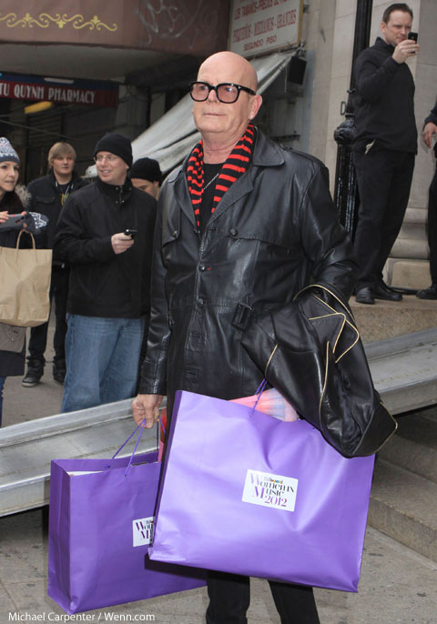 Katy Perry's dad Keith Keith Hudson leaving the 2012 Billboard Women In Music Luncheon with goodie bags.