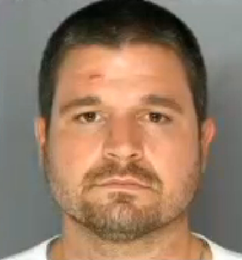Joseph Jackson mug shot after Taylor Swfit Satan sign at Pittsburgh concert