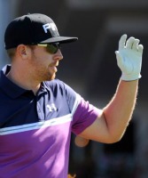 Professional golfer leading major tournament quit upon learning his wife was in labor