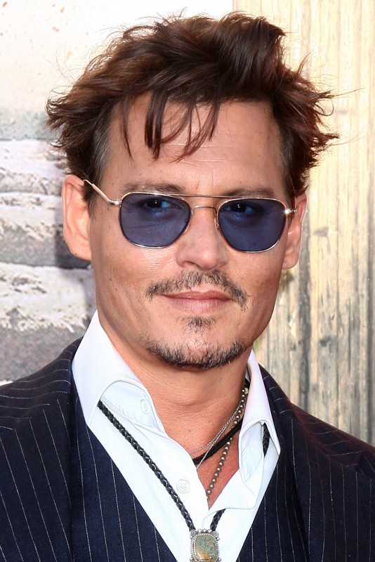 Why does Johnny Depp want to buy Wounded Knee?