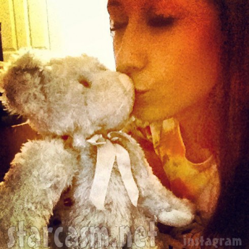 Nikkole Paulun and the teddy bear containing her dead baby Ashton's cremated ashes