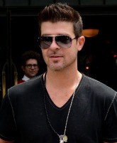Robin Thicke confessed to burning $500,000 on pot