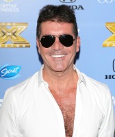 Simon Cowell’s fortune will go to charity, not son