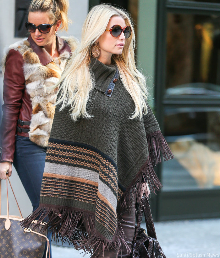 PHOTOS Jessica Simpson pairs sexy leather pants with a poncho