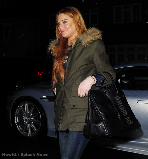 Lindsay Lohan had London police escort her 10 feet to private party