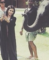 PHOTOS Kim Kardashian gets spooked by a baby elephant, mocked by Kris Jenner