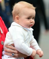 PHOTOS 8-month-old Prince George steals the show during first state trip
