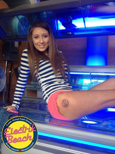 Nikkole Paulun gets tattoo in exchange for free tanning for life