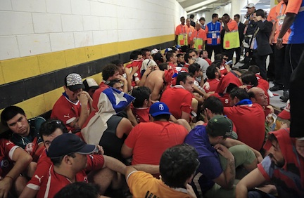 Chilean mob The Chilean fans, detained by Brazilian police. (Photo: Associated Press.)