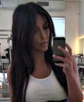 PHOTO Kim Kardashian flaunts her tiny midsection in a waist trainer, but is it safe?