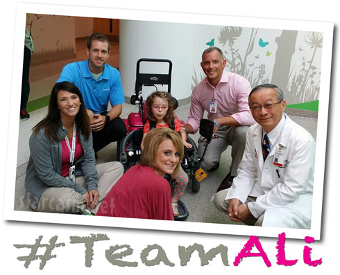 Leah Calvert's daughter Ali gets a new wheelchair - Click to enlarge