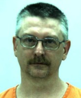 Woman discovers armed man living in her guest bedroom