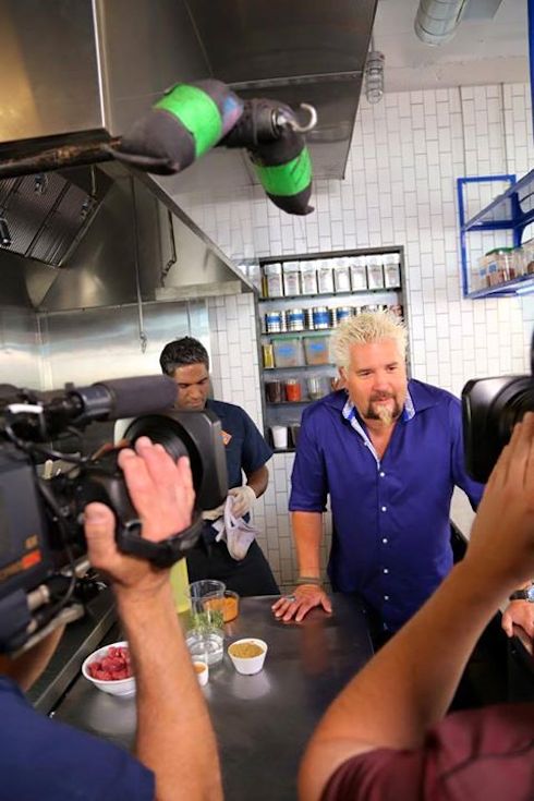 How many restaurants has Diners, Drive-Ins, and Dives visited?