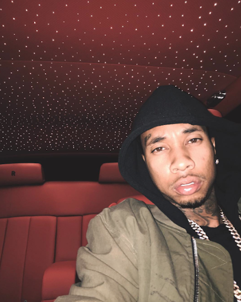 VIDEO Kylie Jenner and Tyga make up: He brings her on stage for a serenade and a kiss