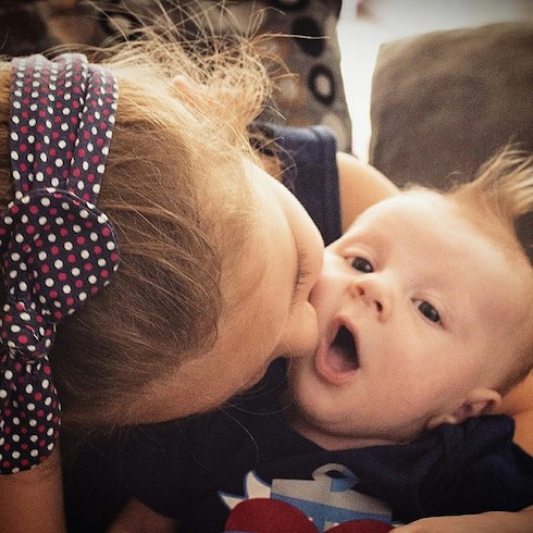 Mother of infant trades gunfire with intruders while breastfeeding