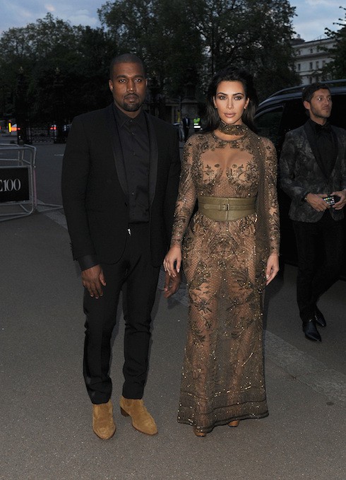 Kim Kardashian and Kanye West leave their hotel and head to the Vogue 100 Gala Dinner, held in Hyde Park