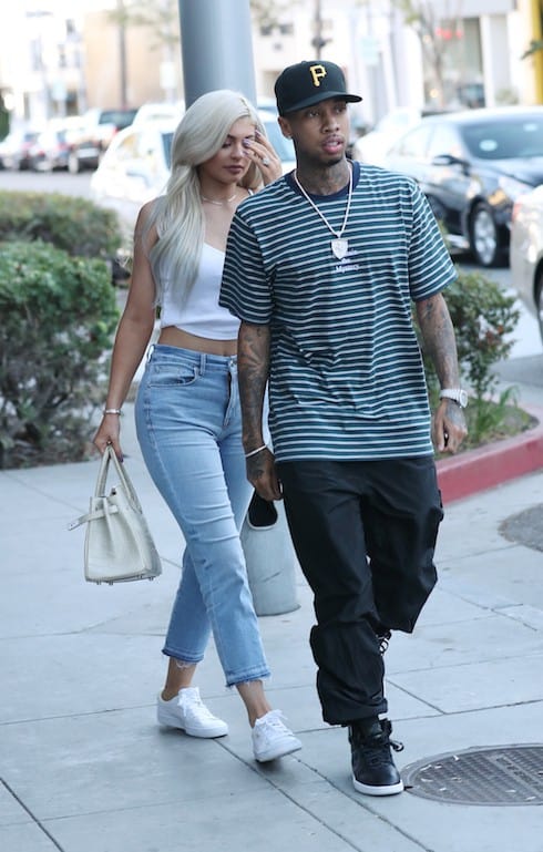Kylie Jenner flashes a huge diamond ring as she leaves La Scala restaurant in Beverly Hills