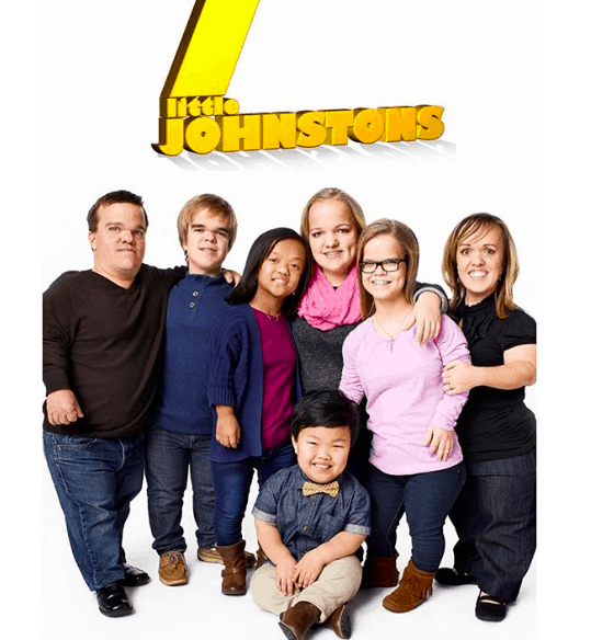 7 LITTLE JOHNSTONS How many of the children are adopted?